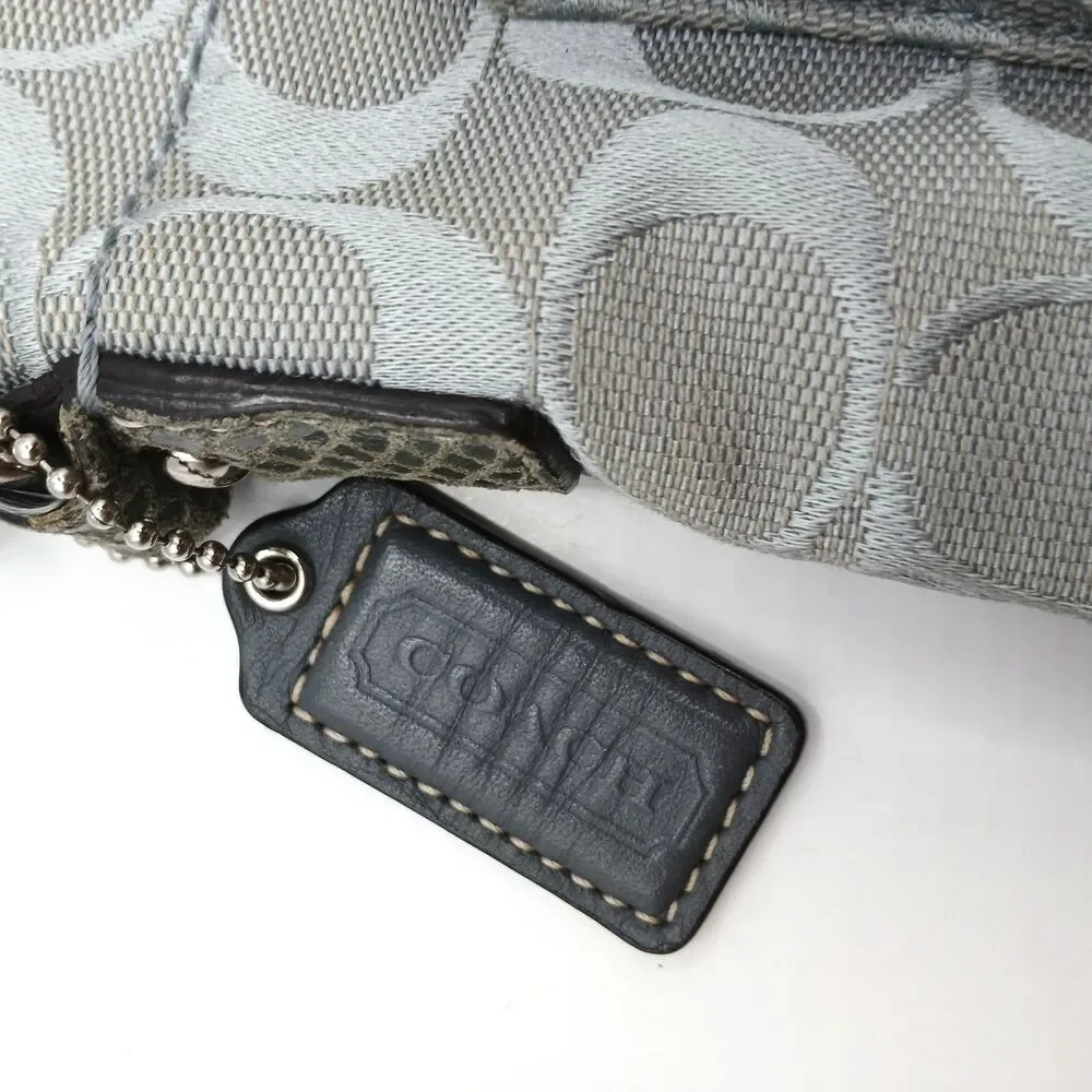 Coach Penelope Signature Turn-Lock Crossbody Bag in Silver With Lavender Lining
